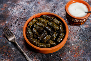 Dolma - stuffed grape leaves with rice and meat.