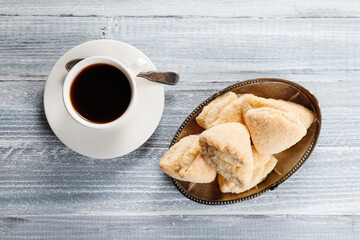 Homemade nut shaped russian soviet cookies and wafer rolls with pastry cream.