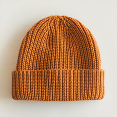 Fototapeta premium Orange knitted wool winter beanie with ribbed texture and a folded brim. Trendy color Ideal for keeping warm in cold weather Isolated on transparent and white background.