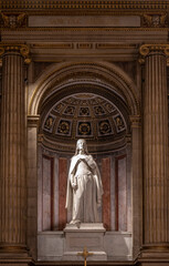 Paris, France - 12 18 2024: View detail of Sainte Amalberge statue inside Madeleine church.