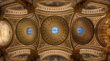 Paris, France - 12 18 2024:Panoramic view of the golden ceiling inside Madeleine church.