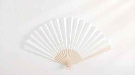 Mockup of a white folding hand fan set apart against a white background	
