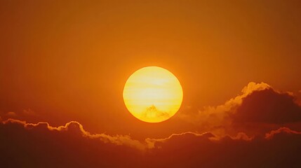 Obraz premium Vibrant Sunrise with Orange Hues Against Blue Sky During Golden Hour in Summer Warmth and Radiant Natural Beauty