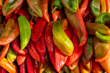 Close-up of peppers of different types displayed in a greengrocer