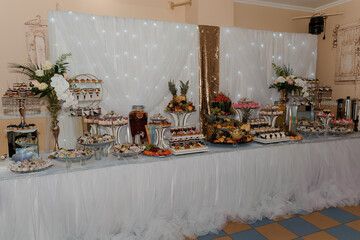 Elegant Dessert Table Display with Assorted Pastries and Sweets