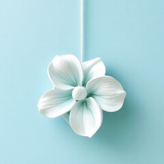 Elegant white flower light pull on pastel blue background.