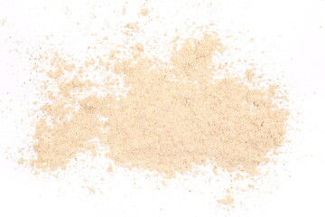 Integral spelt flour scattered, isolated on white, top view