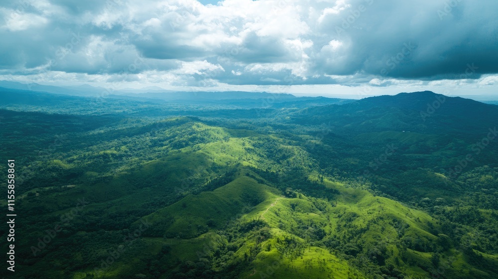 Poster aerial view of lush green mountains under cloudy sky with vast empty space for adding text or graphi