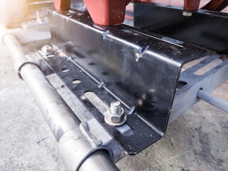 Adjusting the pump machine mounting bolt board.
