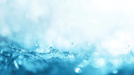 Abstract blurred icy blue water texture with sparkling details suitable for winter themes background and text overlay space