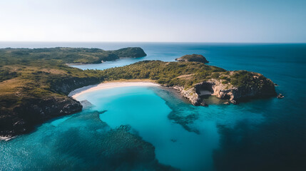 Obraz premium Secluded cove with turquoise water and white sand beach.
