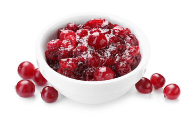 Tasty cranberry sauce in bowl and berries isolated on white