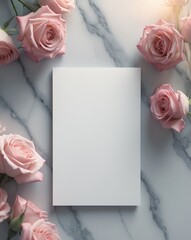 Blank mock up card on a marble table decorated with pink roses