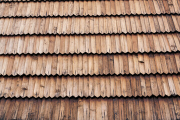 Old traditional wooden shingled roof pattern background, copy space