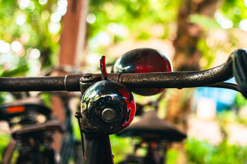Close up of a classic bicycle full of rust and worn out. Details of old bicycle parts that are...