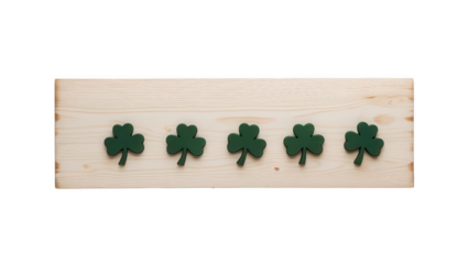 wooden plank with five green shamrock shapes evenly spaced, placed on light natural wood background, isolated on transparency background