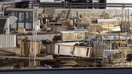 Construction waste and equipment on the roof of the building