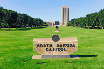 North Dakota State Capitol Building in Bismarck ND.The Pioneer Family Statue was sculpted by Avard...