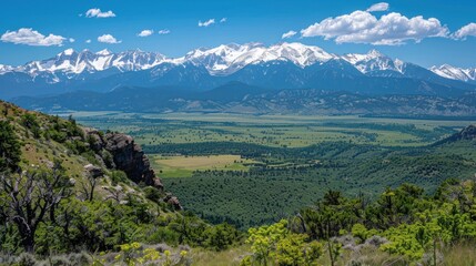 Obraz premium Majestic Mountain Range and Valley Landscape