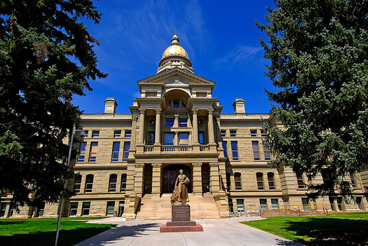 The State Capitol Building at Cheyenne Wyoming WY USA. Esther Hobart Morris is a bronze sculpture  on  lawn is depicting the first woman justice of the peace in the United States by Avard Fairbanks..