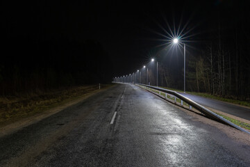 Night Road with Streetlights in Rural Area
