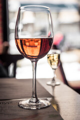 Rose wine and chacha in glasses.
