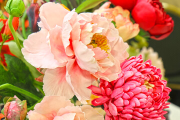 Original flowers made of polymer clay. The most realistic display. Soft focus. Close-up.
