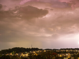 Dramatic evening clouds over a US neighborhood forecasting severe weather
