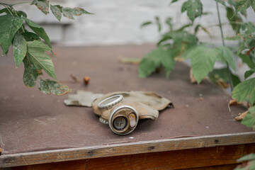 Abandoned Gas Mask on Weathered Surface