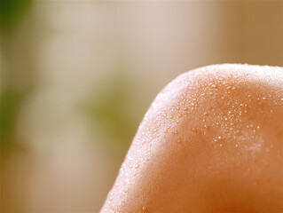 Fototapeta premium Close-up of dewy skin glistening in soft light, capturing natural beauty and skincare concepts with a fresh and radiant vibe.