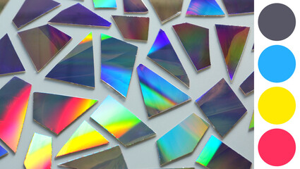 Shiny iridescent splinters on white background