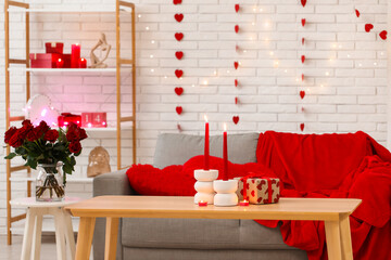 Interior of festive living room with different decorations for Valentine's Day celebration