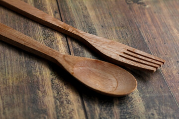 wooden spoon and fork on board