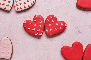 Tasty heart shaped cookies on pink grunge background. Valentine's Day celebration