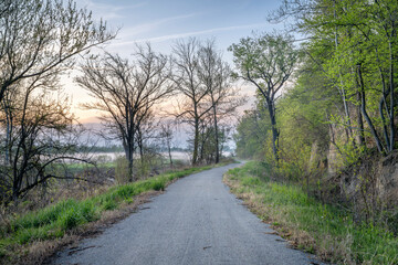 Steamboat Trace, bike trail converted from an abandoned railroad, near Peru, Nebraska, springtime morning scenery