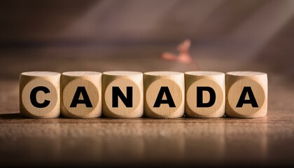 CANADAの英語の文字が書かれた木製のキューブブロック。aiで生成