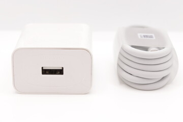 Mobile phone charger with usb cable isolated on white background