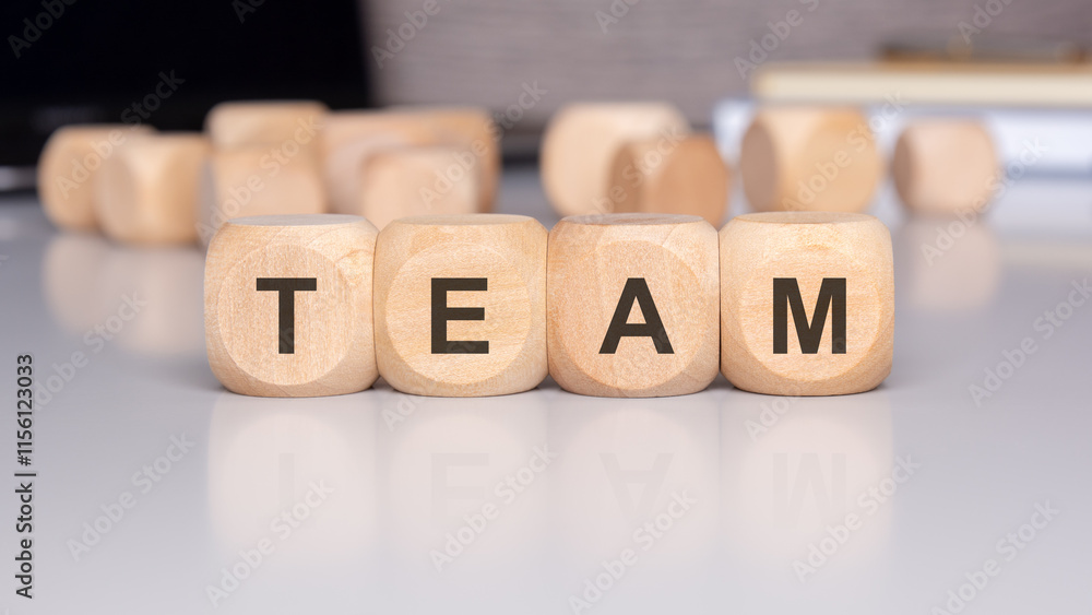 Poster the concept of team collaboration depicted with wooden blocks represents unity and teamwork