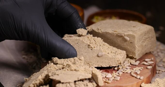 halva from roasted sunflower seeds and crushed into one solid mass, a sweet delicious dessert made from fried sunflower seeds
