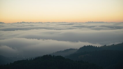 Sunset Above the Clouds: A Serene Mountain Vista