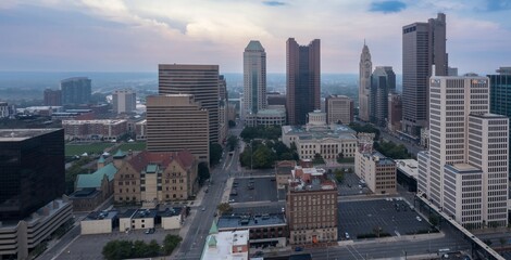 Fototapeta premium High-angle view of downtown Columbus, OH. Modern and historic buildings, including the Columbus Public Library, are visible. Urban landscape. DOWNTOWN, COLUMBUS, OHIO, UNITED STATES