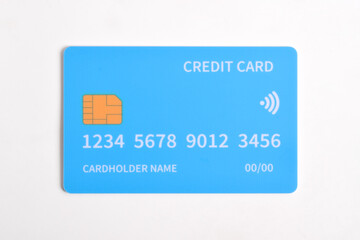 Blue bank credit card isolated on white background, top view