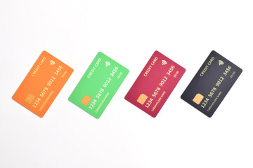 Four credit cards with chip on white background. Top view