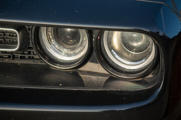 A close-up of a car headlight