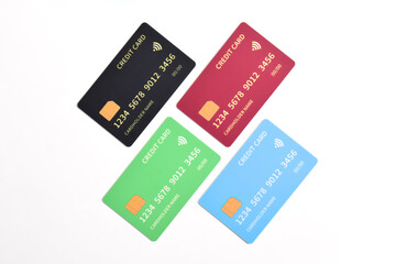 Four credit cards with chip on white background. Top view