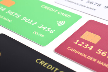 Multicolored credit cards isolated on white background