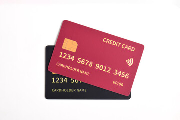 Two credit cards isolated on white background. Red and Black credit cards
