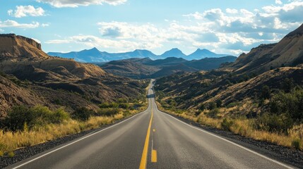 Naklejka premium A scenic drive through volcanic mountains, black rocks and sparse vegetation 