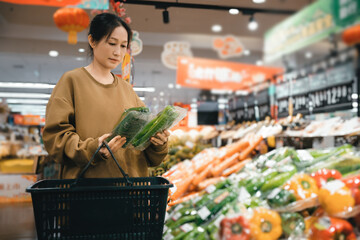Exploring Fresh Produce: A Woman's Journey in a Vibrant Supermarket