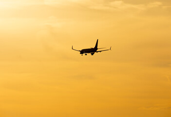 Commercial airplane midair preparing to land